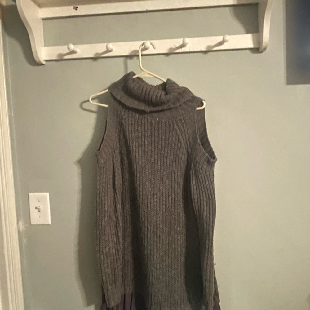 Open shoulder, turtle neck,long sweater w cute trim. cute w leggings and boots